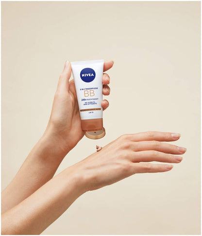 NIVEA BB Cream for Face, Hydrating Tinted Daily Moisturizer with Natural Coverage for Medium to Dark Skin Tones, Lightweight Skin-Perfecting Cream with Minerals, Jojoba Oil and Pro-Vitamin B5, 50 ml